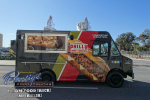 side view of black and red Philly Connection food truck with closed service window