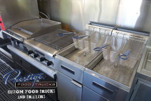food truck interior with fryer and other appliances