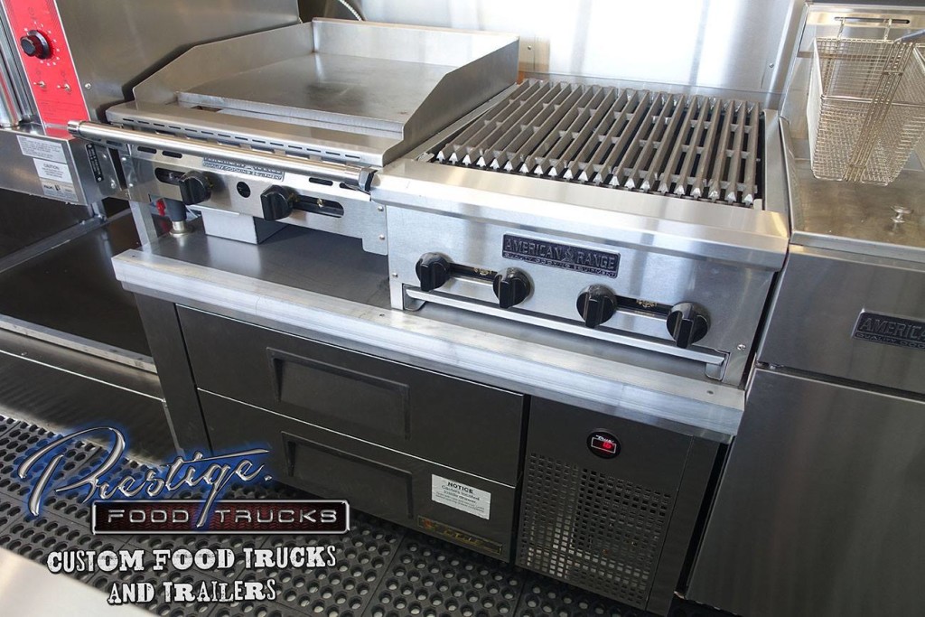 close up of grill and stove in food truck kitchen