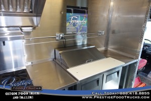 interior photo of a food truck showing sandwich prep station