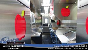 interior of applebees food truck with various appliances