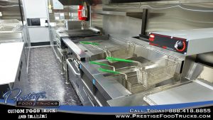 food truck interior with grill & fryers