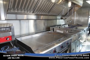 food truck interior detail of grill and exhaust hood