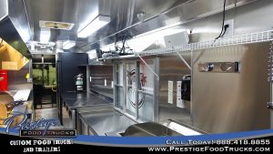 interior photo of a food truck showing service window and appliances