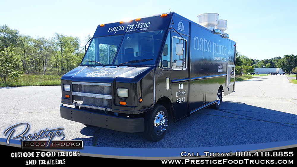 front & side 3/4 view of black food truck
