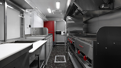 mane fare food truck interior with kitchen equipment