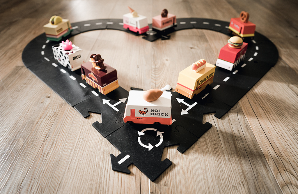 toy food trucks on track shaped like a heart